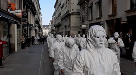 'White mask' protesters march through Nantes to denounce COVID-19 curbs on freedom