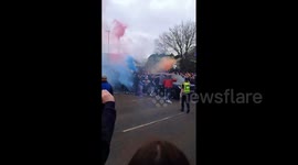 Glasgow Rangers fans mob Steven Gerrard as he leaves training centre after first title win in decade