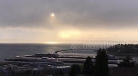 Stunning sunset footage over Seattle as a late afternoon storm rolls through