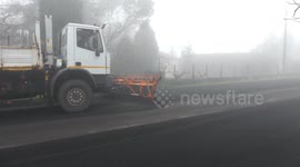 Trucks clear roads of ash as volcanic rocks continue to shower Sicilian town after Mount Etna eruptions