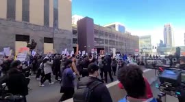 Protestors march in Minneapolis as jury selection of Derek Chauvin trial is delayed