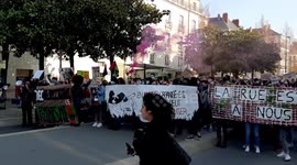 Feminists display banners and chant on Women's day in Nantes, France