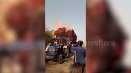 Crops being transported in tractor catches fire in central India