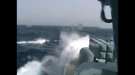 Giant waves smash into German warship of African coast