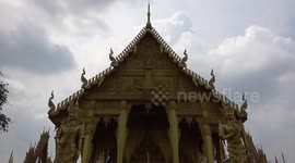 Buddhist temple painted entirely in gold in Thailand