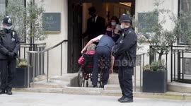 A Nurse Helps a Disabled Patient to The Lift at The Main Entrance at The King Edward VII Hospital
