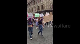 Dozens injured as feminist protesters clash with police in Mexico’s capital