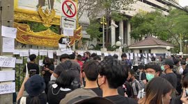 Thailand protesters stick anti-monarchy banners on court gates after leaders are denied bail