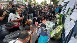 Thailand protesters light candles outside court after leaders are denied bail