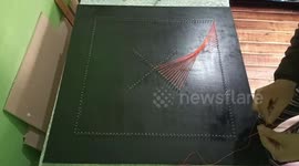 'Timelapse of String Artist Creating a Mandala Using Two Colors '