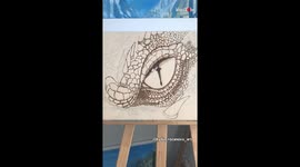 'Drawing Smaug's Eye on Wooden Board Using Pyrography'