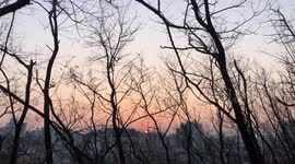 Sunset seen from the top of a mountain, a breathtaking view, with a colorful beautiful sky.