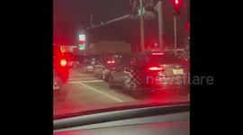 Dozens of vehicles queue outside COVID-19 vaccine centre in Florida