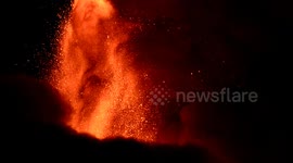 Mount Etna erupts, spews bright orange lava into the sky