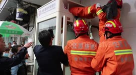 Firefighters rescue boy after he locked himself inside ATM booth