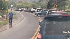 flooded area on oahu, cars turning around after waiting for hours, roads closed, nobody allowed to drive