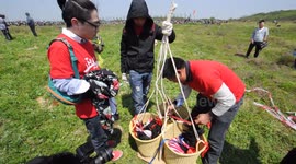 Goats take a flight on an enormous kite in China