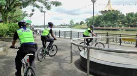 Malaysian police patrolling on bicycles