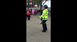 Policewoman does keepie uppies at Wembley