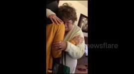 Grandma's amazing emotional reaction to tattoo portrait