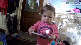 Toddler runs away from on-screen spider
