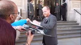Joss Whedon signs autographs