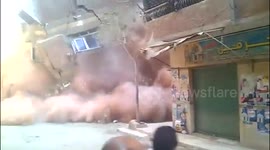 Residents escape huge building collapse in Cairo