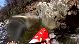 Kayaker swims class 5 rapid