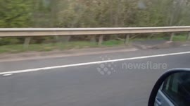 Superman planking on motorcycle