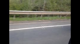 Man performs superman motorbike stunt on motorway