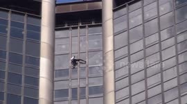 'French Spiderman' climbs the Tour Montparnasse