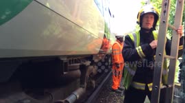 London commuters evacuated onto train tracks