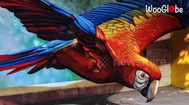 Mexican street artist paints jaw-dropping 3D mural of parrot