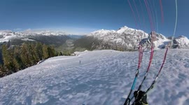 Speed flyer comes dangerously close to ground as he descends down Austrian mountain