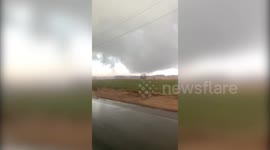 Storm chasers film pursuit of menacing cloud formations as tornado warning issued in Minnesota