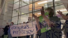 UK nurses take aim at Boris Johnson and Rishi Sunak at slow handclap protest