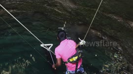 Rescuer is lowered into deep well to save aggressive viper in India