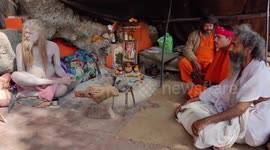 Hindu pilgrims and mystics gather on river Ganges for holiday of Kumbh Mela
