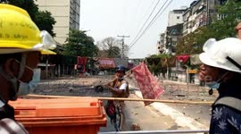 Myanmar protesters make roadblocks with women's clothes to deter soldiers