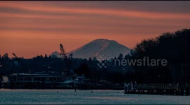 Watch this stunning sunrise time-lapse of Mount Rainier as viewed from Seattle in Washington State