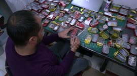 Palestinian artist in Gaza creates political work from used sardine cans