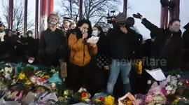 Crowd at Sarah Everard vigil boo police officer on Clapham Common bandstand