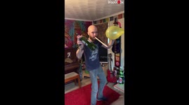 Scotsman Uses Mouthstick to Perfectly Balance a Wine Bottle Over Inflated Balloon