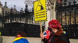 Man with giant megaphone shouts 'kill the bill!' in direction of Houses of Parliament