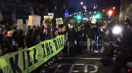 Protesters hold 'Kill the bill' sign as they take over Westminster Bridge in central London
