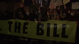 Protesters chant