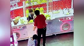 Chinese girl gets stuck in claw machine after climbing inside to claim prizes