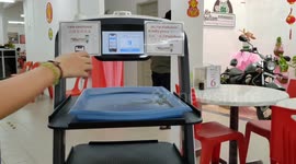 Malaysian restaurant owners employ robot waiters during pandemic