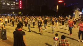Chinese Plaza Dancing Group gets Excited for Exercise in Wuyi Square Fuzhou, Fujian Province