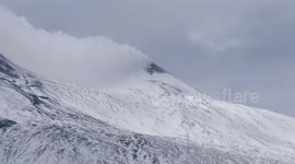 Mount Etna coated in snow just a day after latest eruption